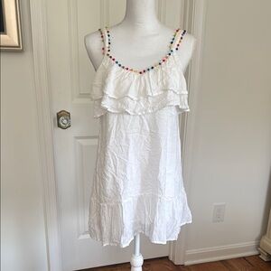White Ruffle Dress with Colorful Pom-Pom Trim